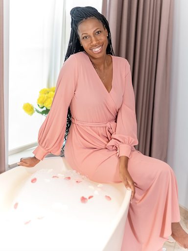 Dr Catherine J Mills wearing a pink outfit