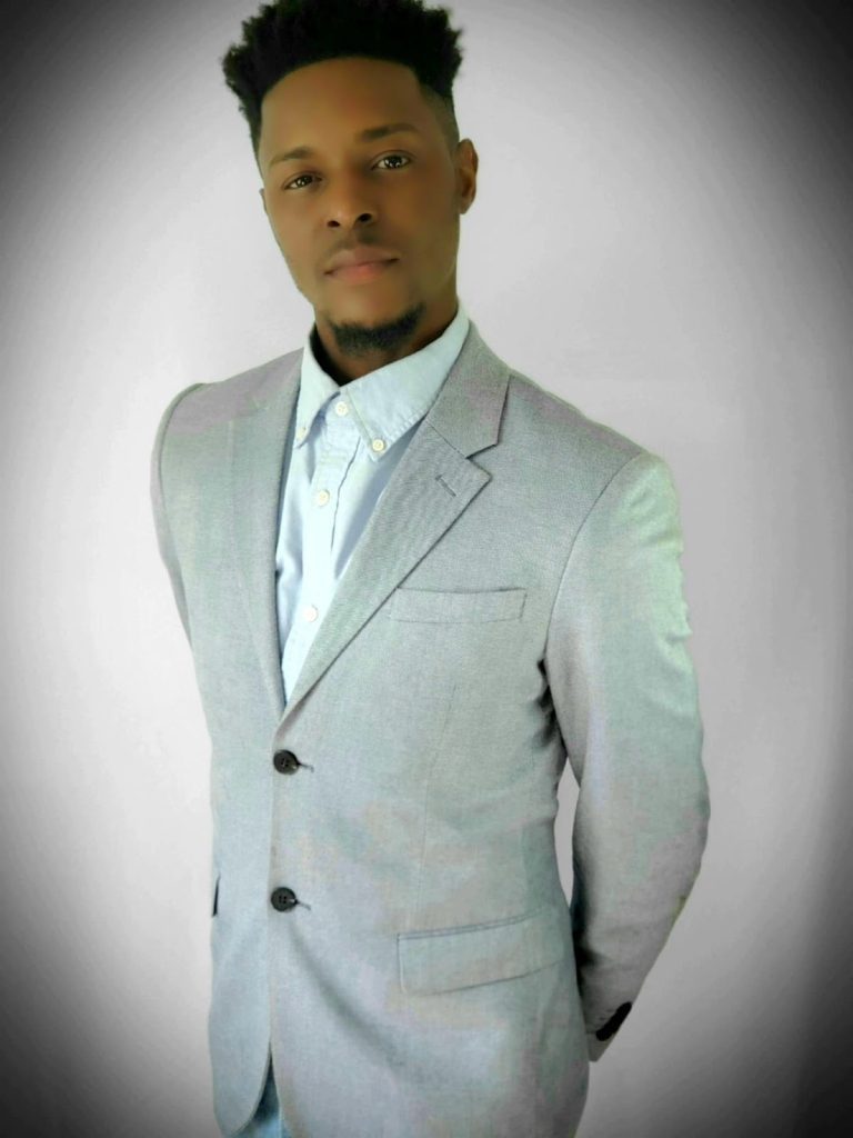 Rising Musician Kylrin Byron official image in white gray coat