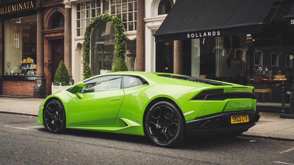 photo of parked lime green lamborghini