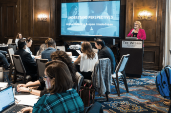 Kim Carp Speaks at a conference