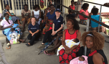 Liz, Bloomfield, sitting with a group of people outside