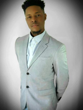 Rising Musician Kylrin Byron official image in white gray coat